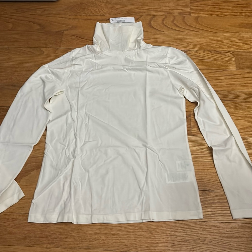 J Crew Women’s Tissue Turtleneck White (also in navy & black)